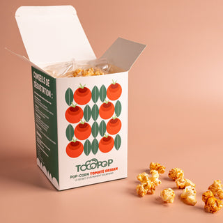 Photo de la boite de PopCorn Tomate Origan avec aperçu du pop-corn